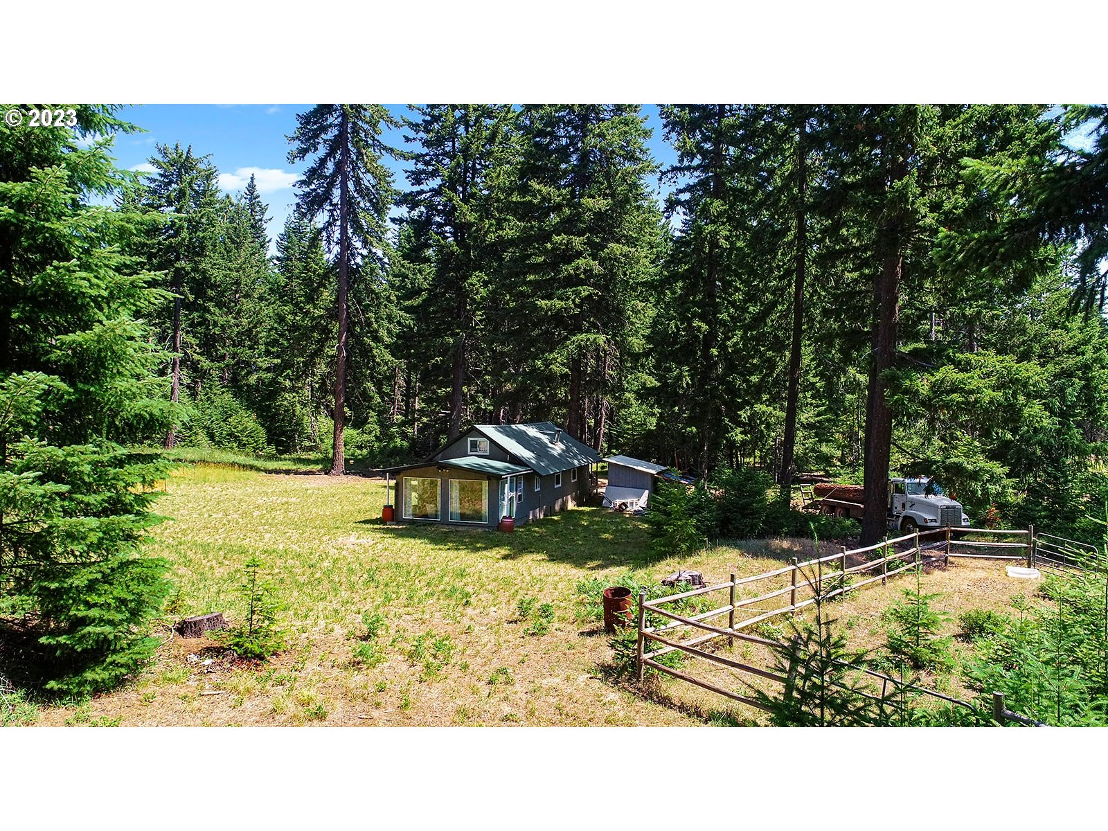 21 Prairie Road Appleton, WA 98602 - Photo 9 of 39 a view of a swimming pool with a garden