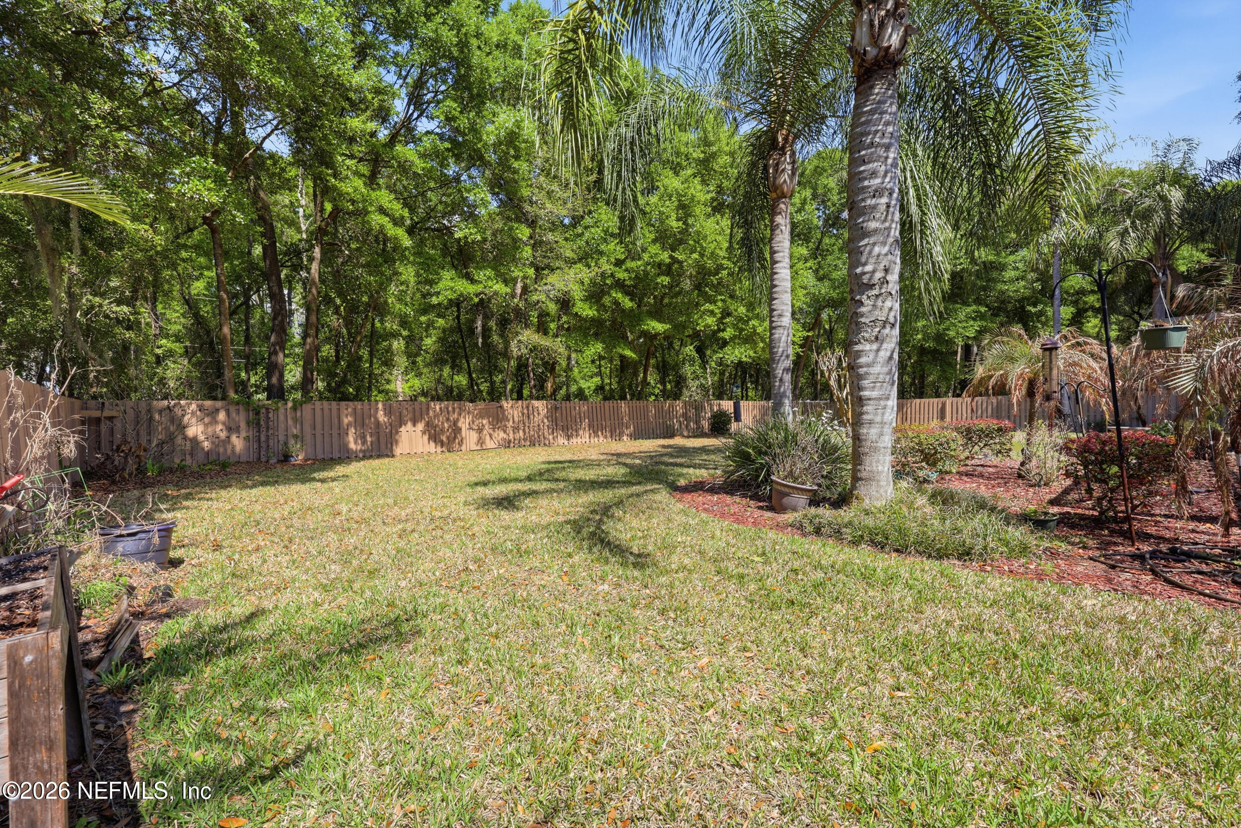 376 North Lombardy Loop St. Johns, FL 32259 - Photo 39 of 81 Oversize fence in yard