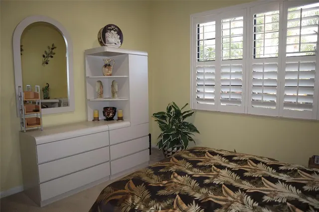 a bathroom with a shower a toilet and sink
