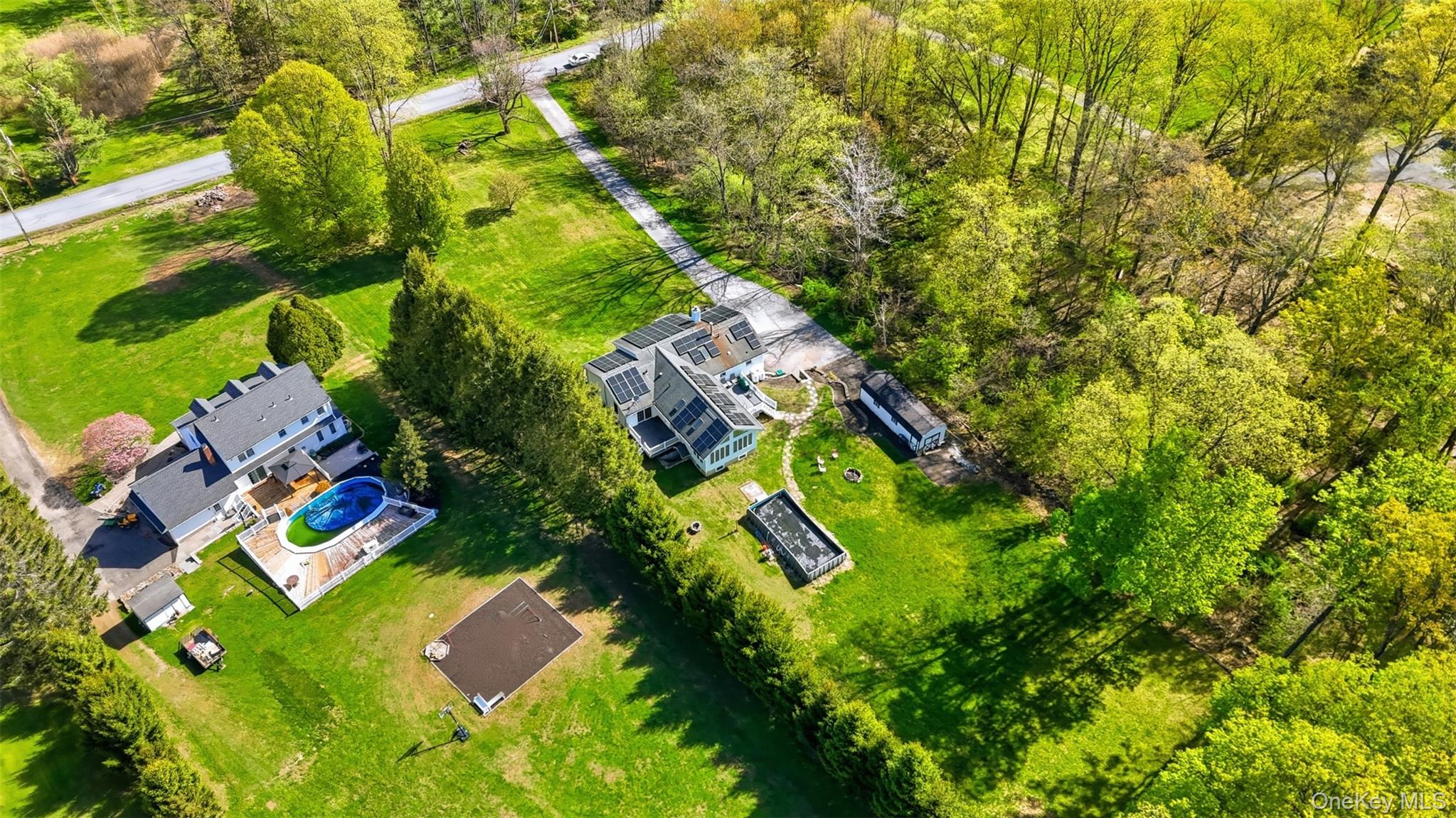 65 Judson Road Montgomery, NY 12549 - Photo 3 of 41 an aerial view of residential houses with outdoor space and trees