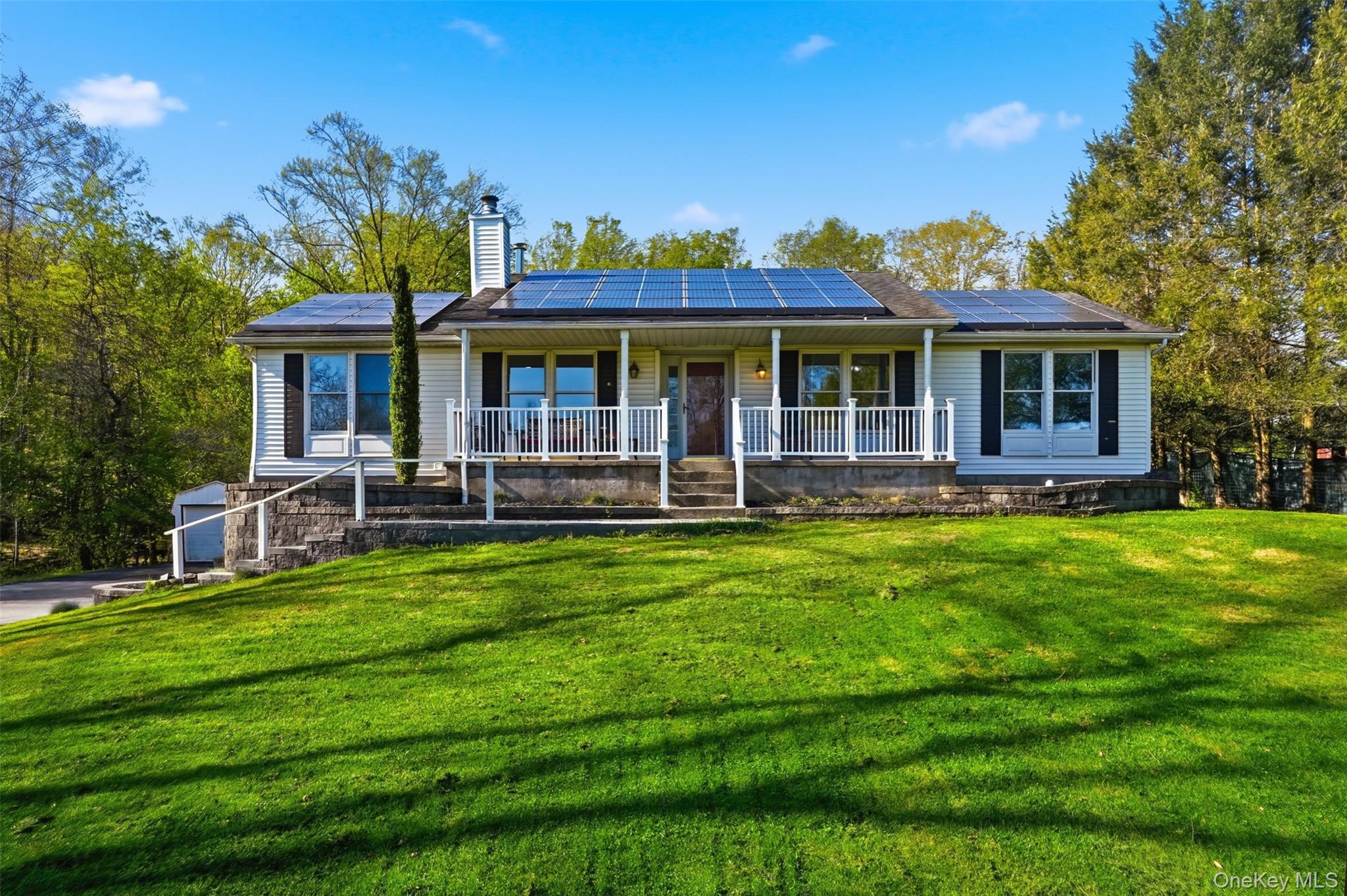 65 Judson Road Montgomery, NY 12549 - Photo 40 of 41 a view of a house with a backyard porch and sitting area