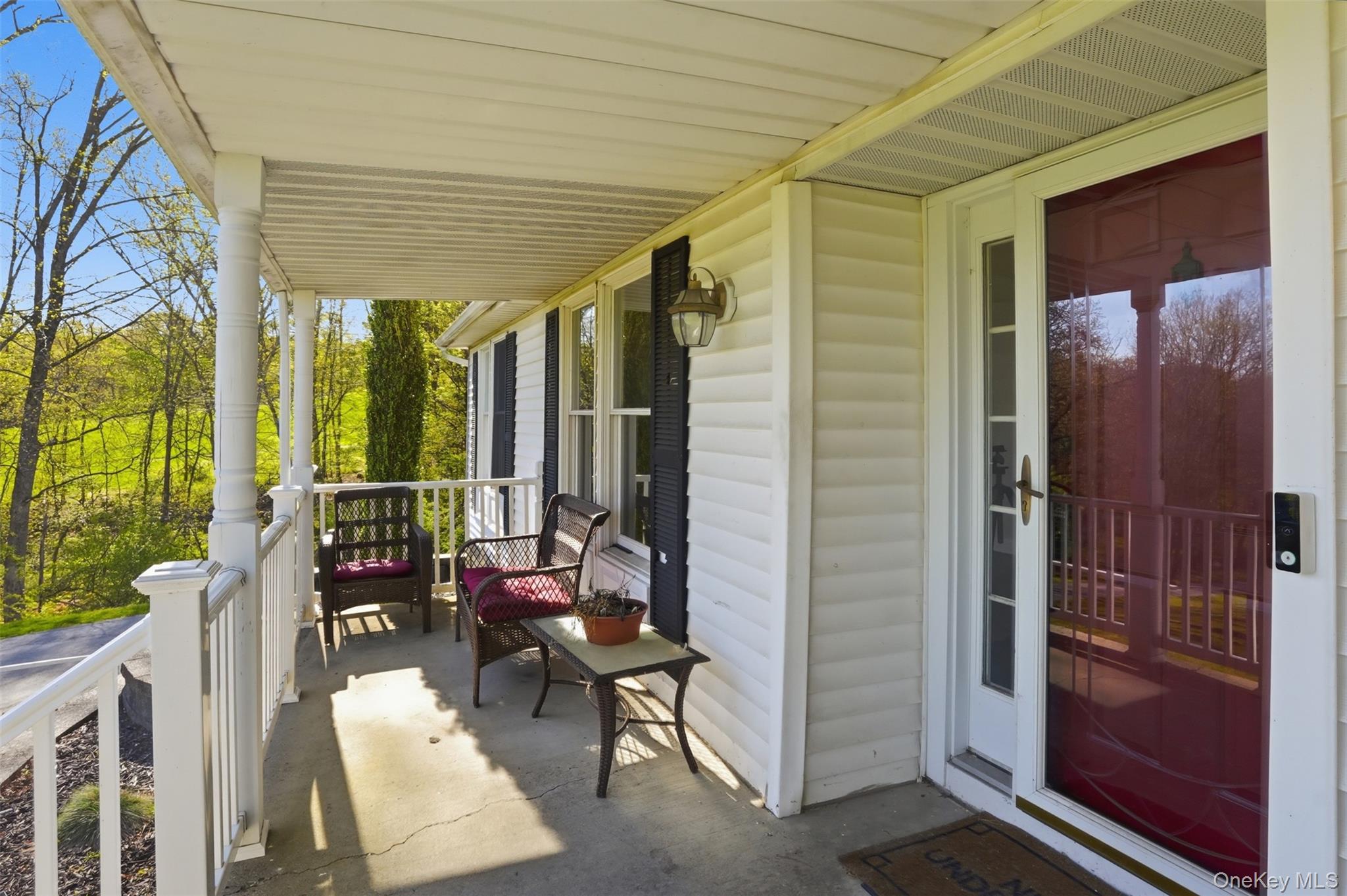 65 Judson Road Montgomery, NY 12549 - Photo 7 of 41 a outdoor space with patio furniture and floor to ceiling window