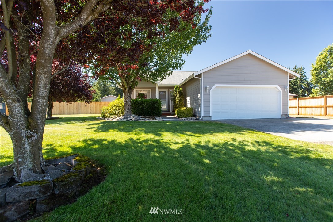 4129 Coomer Lane Southwest Rochester, WA 98579 - Photo 2 of 31 a view of a house with yard and tree s