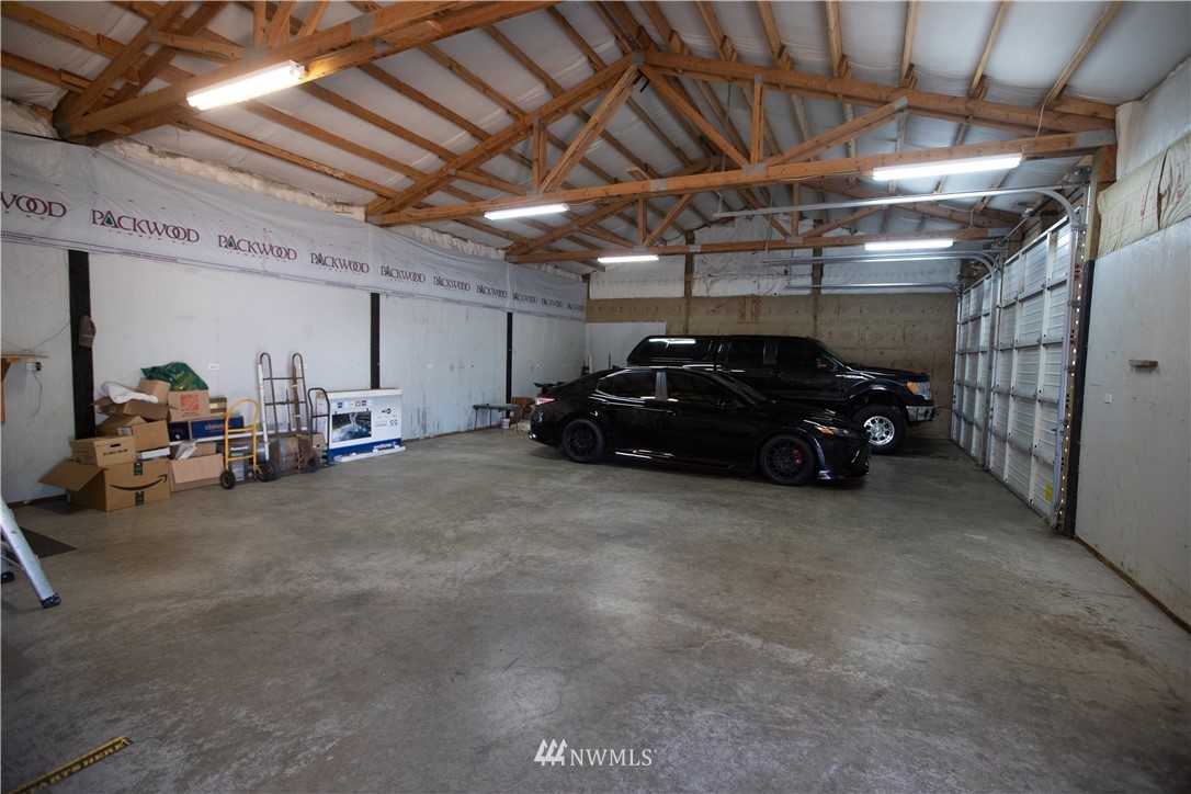 4129 Coomer Lane Southwest Rochester, WA 98579 - Photo 15 of 31 a car parked in a garage