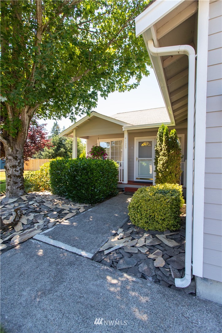4129 Coomer Lane Southwest Rochester, WA 98579 - Photo 3 of 31 a view of a house with a yard