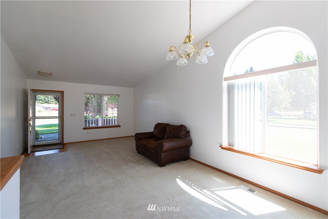 4129 Coomer Lane Southwest Rochester, WA 98579 - Photo 22 of 31 a living room with furniture and a window