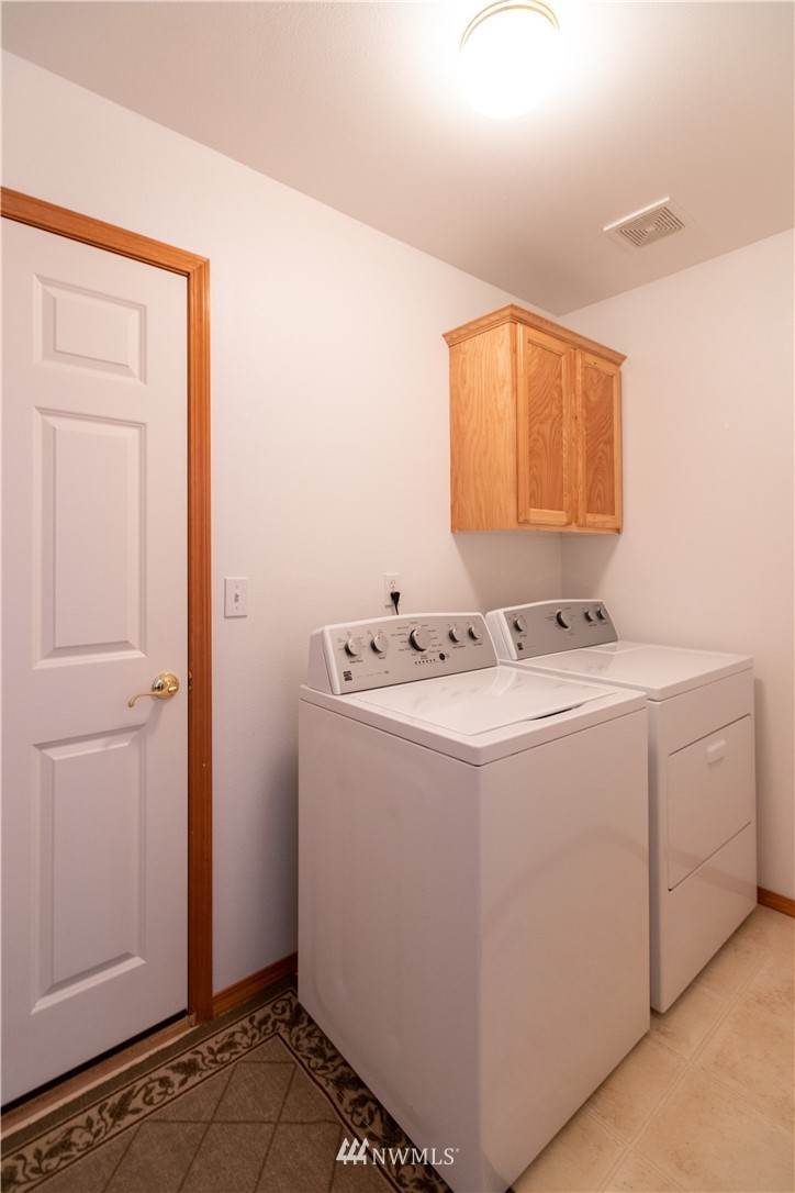 4129 Coomer Lane Southwest Rochester, WA 98579 - Photo 31 of 31 a utility room with dryer and washer