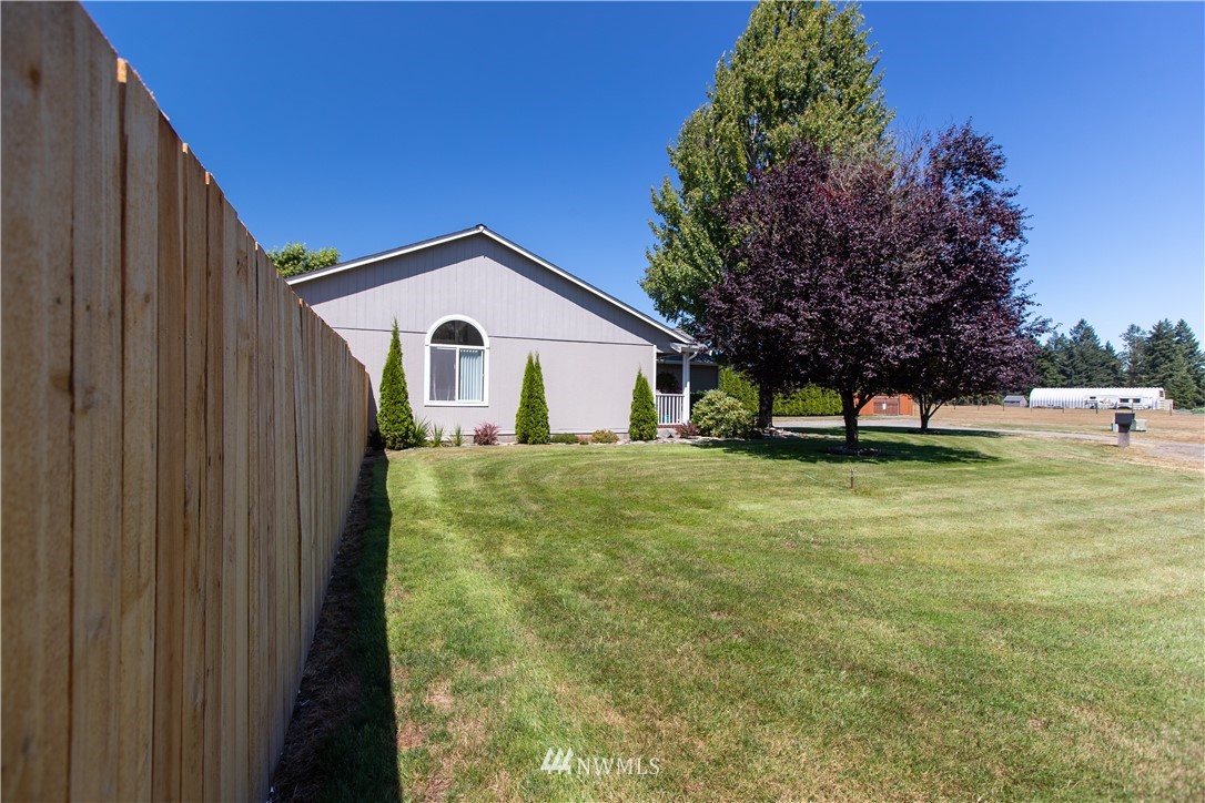 4129 Coomer Lane Southwest Rochester, WA 98579 - Photo 6 of 31 a view of an house with backyard space and garden