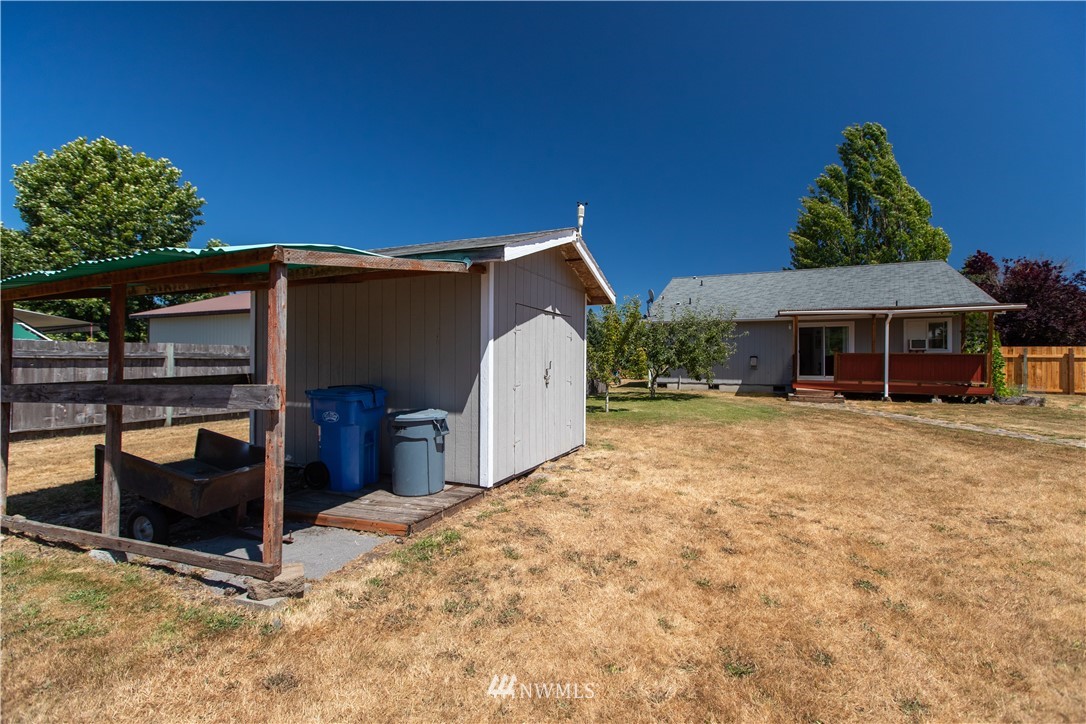 4129 Coomer Lane Southwest Rochester, WA 98579 - Photo 8 of 31 a front view of a house with a yard