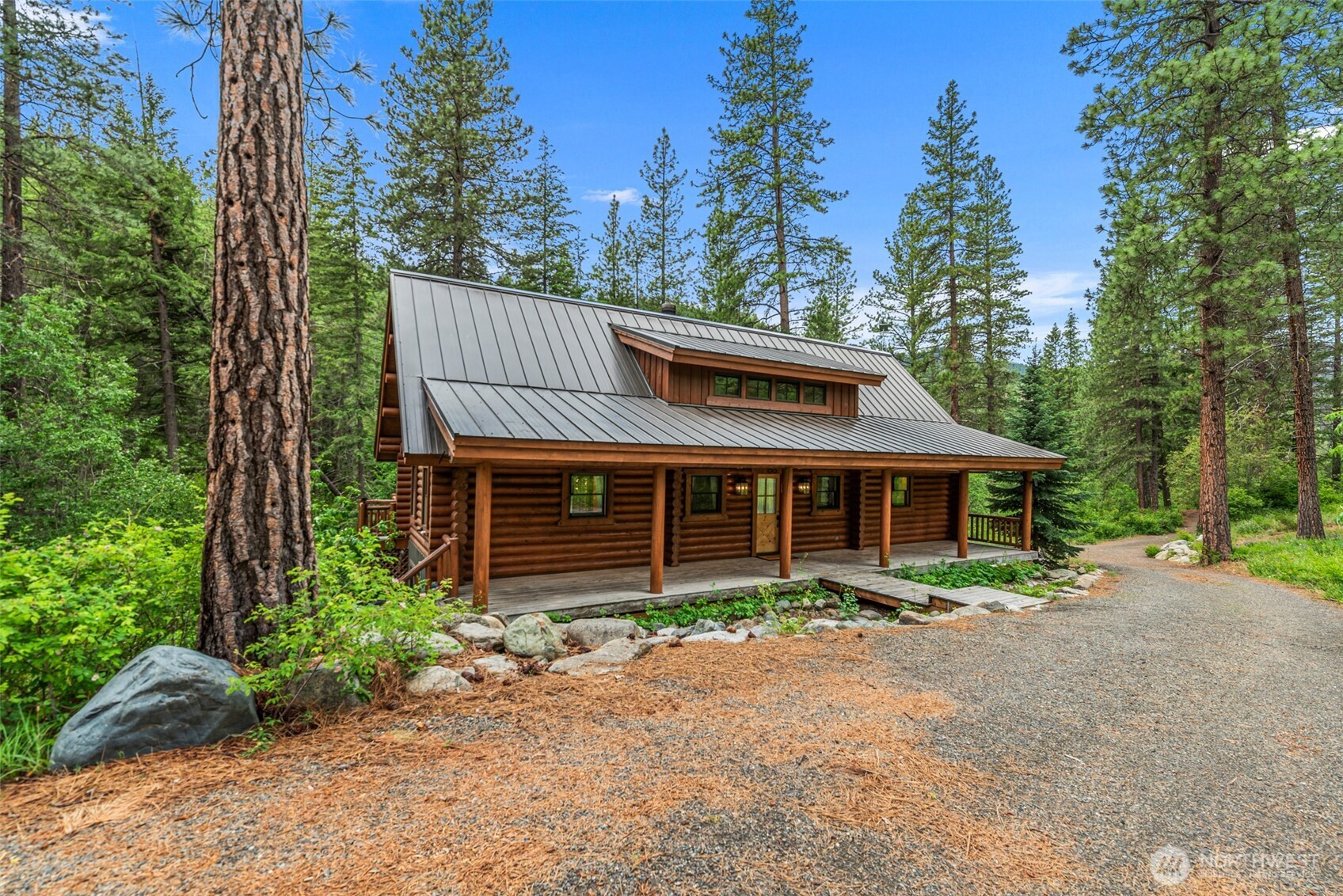 3888 Camas Creek Road Peshastin, WA 98847 - Photo 2 of 40 a front view of a house with garden
