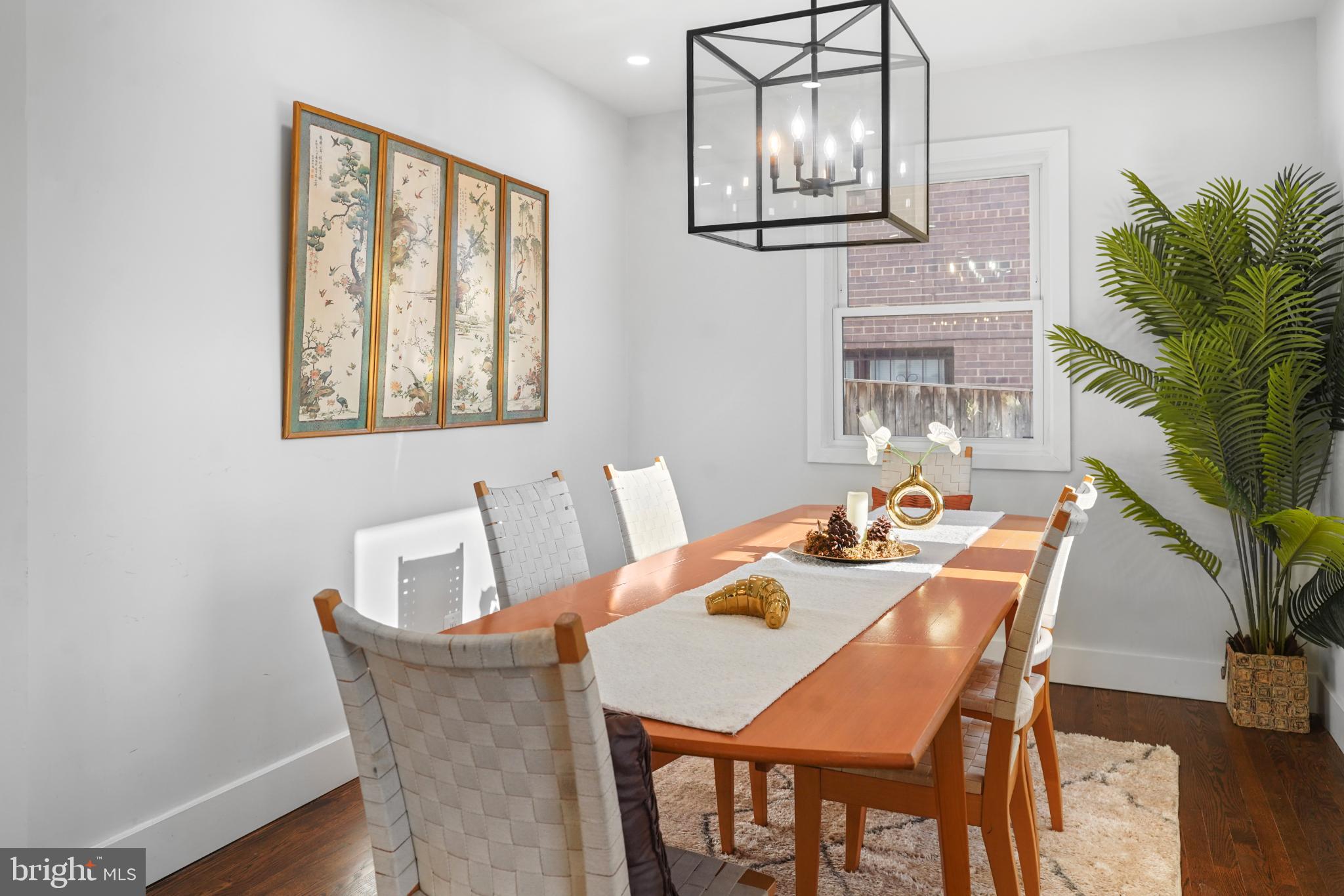 1790 Verbena Street Northwest Washington, DC 20012 - Photo 13 of 31 a view of a dining room with furniture and chandelier