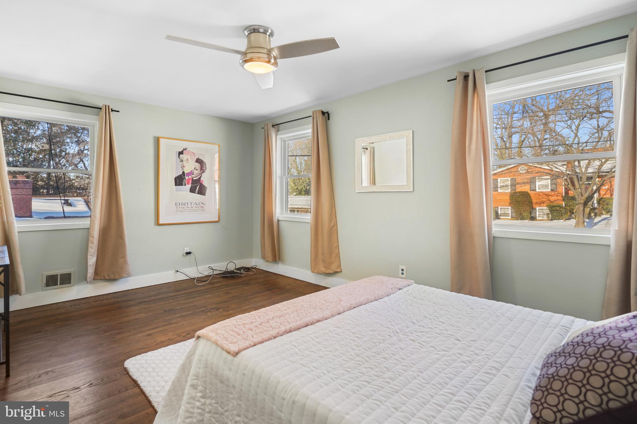 1790 Verbena Street Northwest Washington, DC 20012 - Photo 15 of 31 a bedroom with a large bed and a window