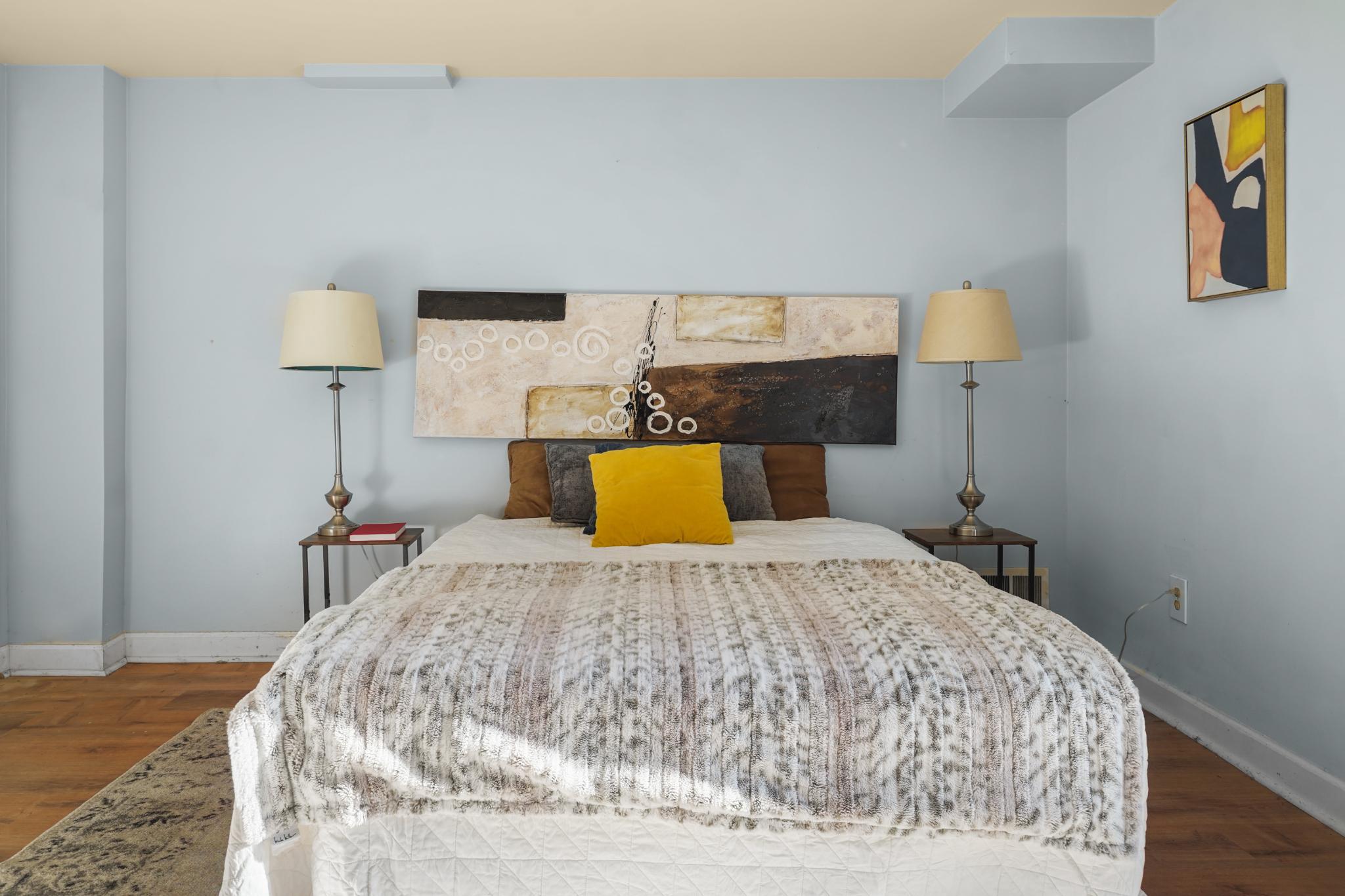 1790 Verbena Street Northwest Washington, DC 20012 - Photo 26 of 31 a bed sitting in a bedroom with a lamp