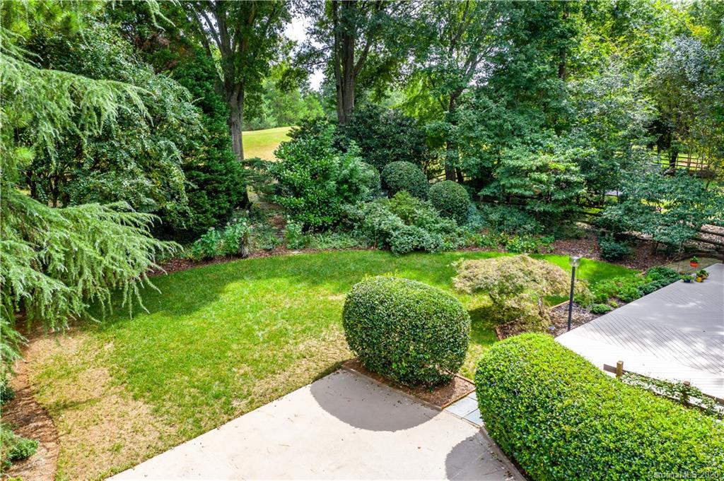 5220 Rounding Run Road, Unit 159 Charlotte, NC 28277 - Photo 14 of 42 a view of a garden with a fountain