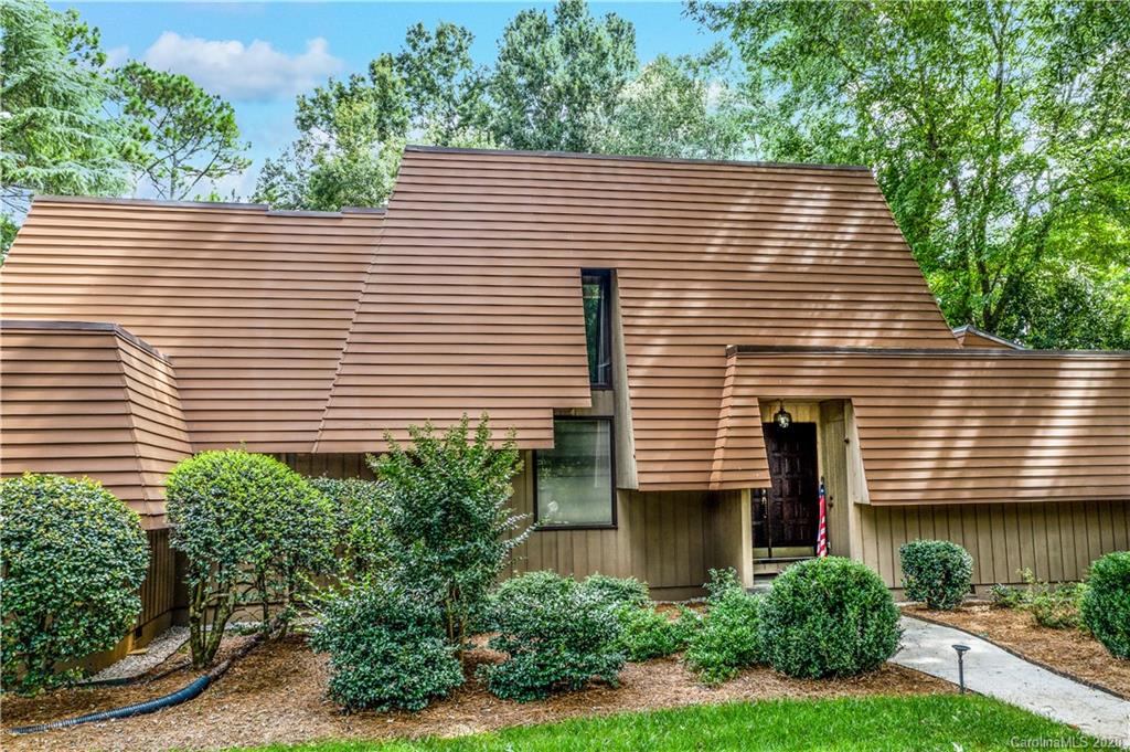 5220 Rounding Run Road, Unit 159 Charlotte, NC 28277 - Photo 8 of 42 a front view of a house with a yard