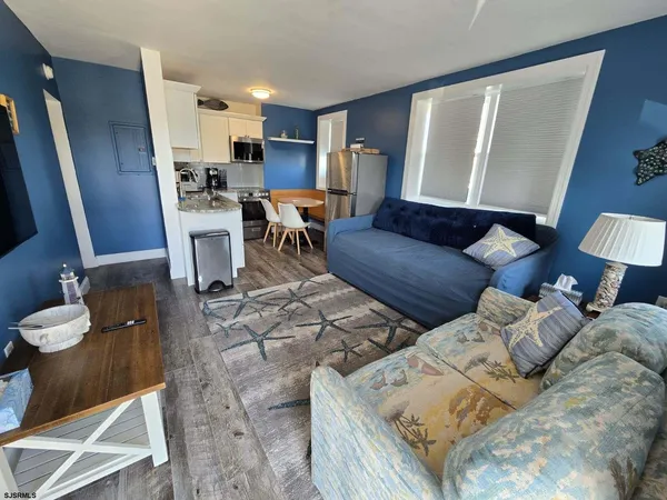 a living room with furniture and a couch