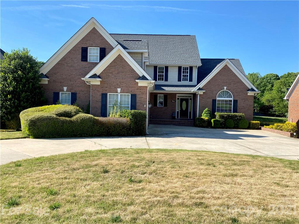 916 Ashford Way Fort Mill, SC 29708 - Photo 1 of 15 a front view of a house with a yard