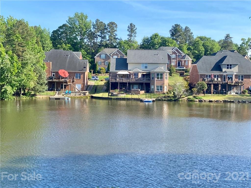 916 Ashford Way Fort Mill, SC 29708 - Photo 13 of 15 an aerial view of a house with swimming pool and lake view