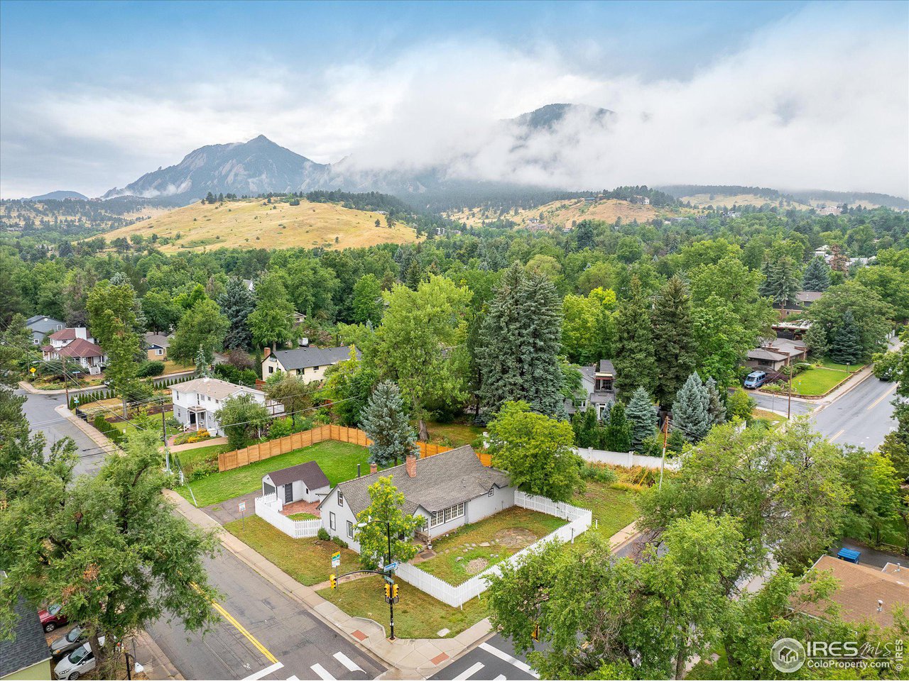 1928 Baseline Road Boulder, CO 80302 - Photo 2 of 5 a view of a swimming pool with a yard
