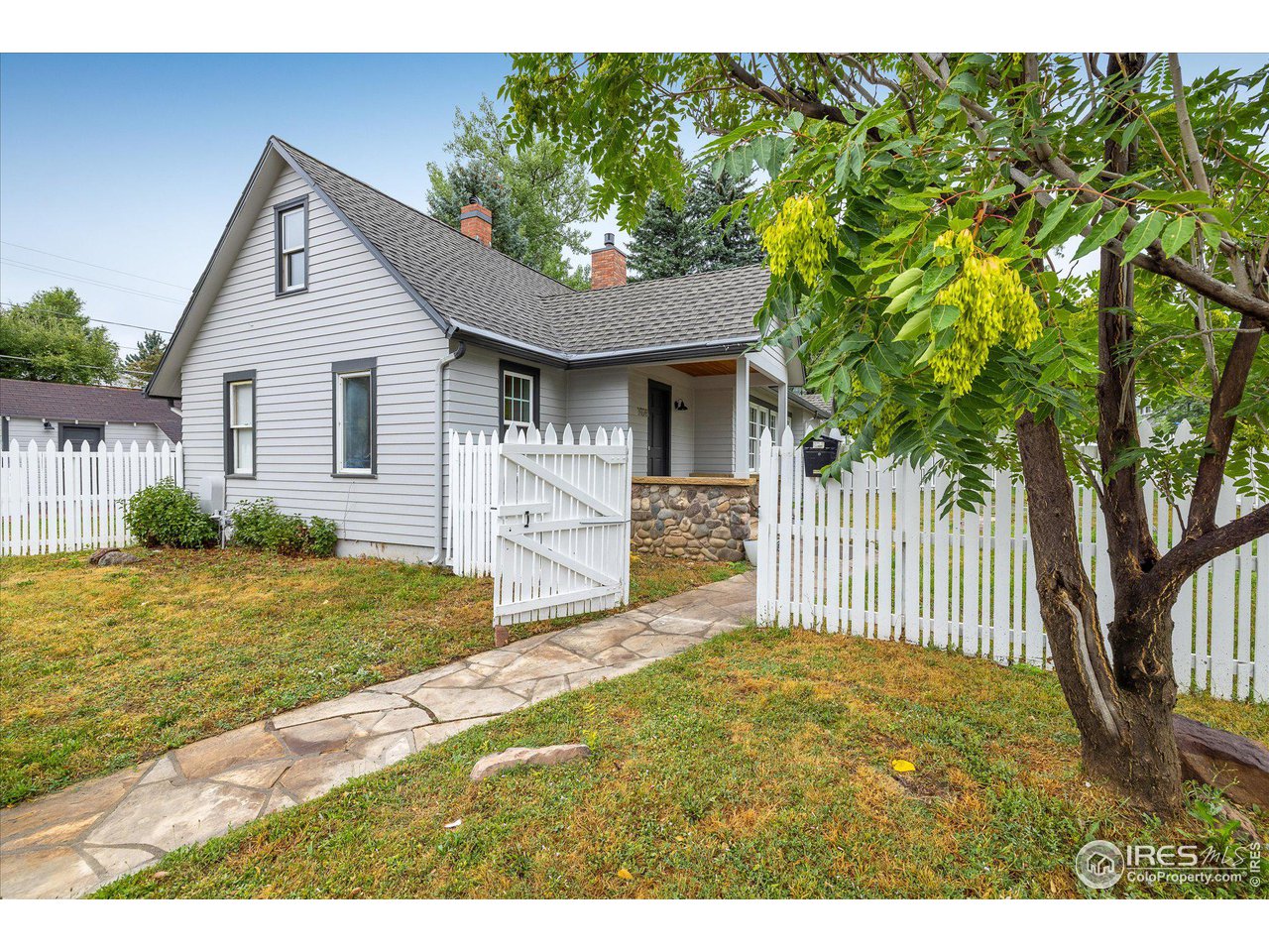1928 Baseline Road Boulder, CO 80302 - Photo 3 of 5 a house view with a garden space