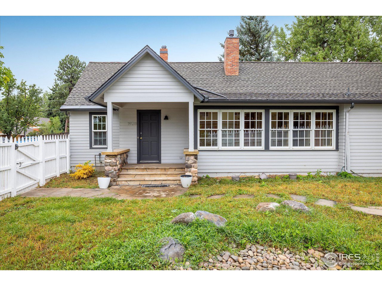 1928 Baseline Road Boulder, CO 80302 - Photo 4 of 5 a view of a house with pool and sitting area