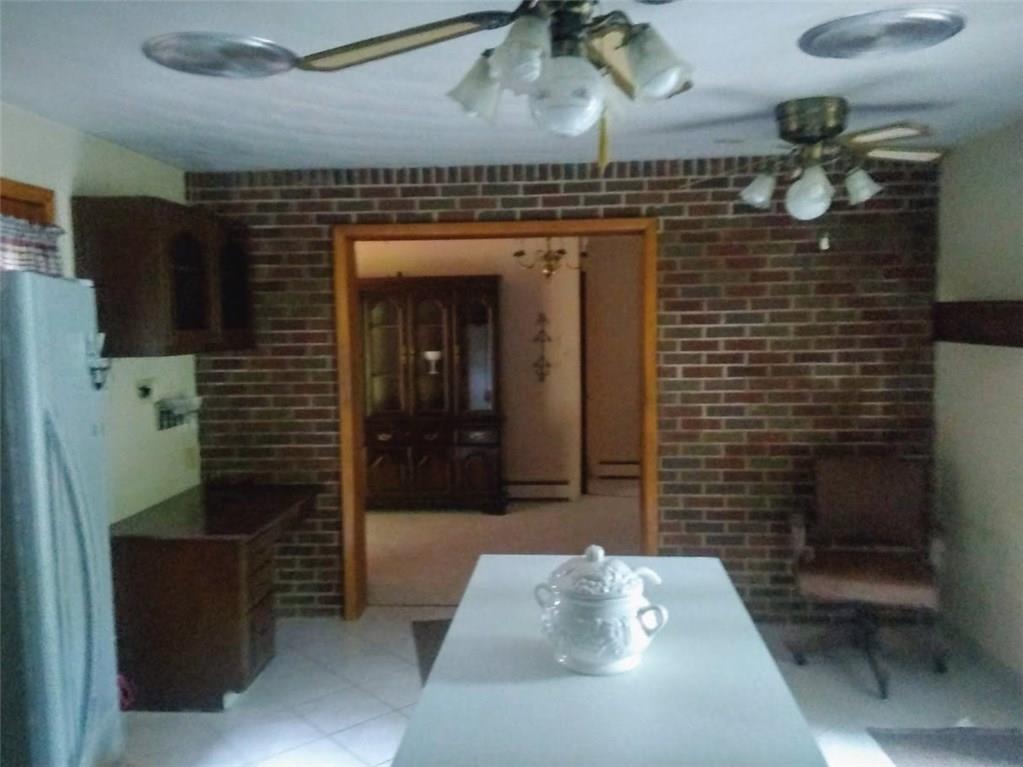 188 Metz Road Parker, PA 16049 - Photo 7 of 25 Kitchen desk and room for table on right side