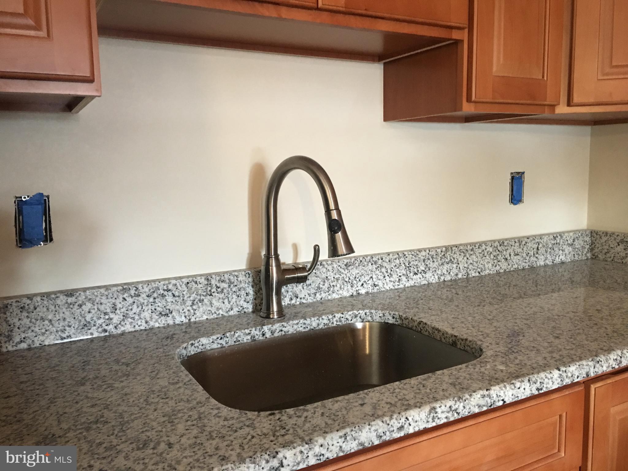 1 Pennsylvania Road, Unit 8 Glassboro, NJ 08028 - Photo 10 of 37 a close view of sink and tap