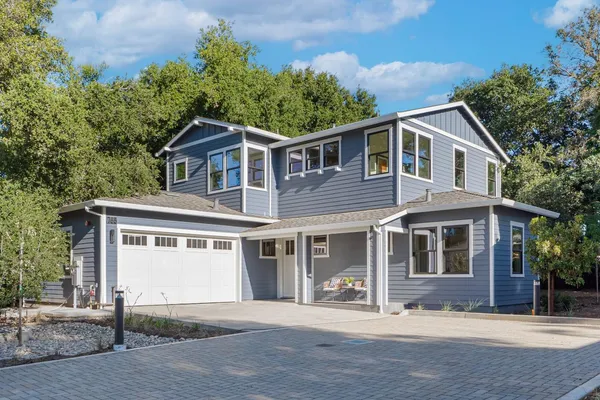 front view of a house with a yard