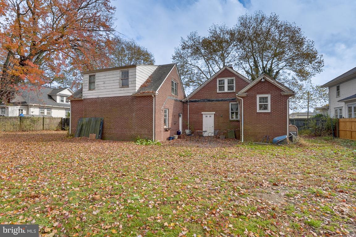 149 Highway 45 Mannington, NJ 08079 - Photo 23 of 24 a front view of a house with a yard and garage