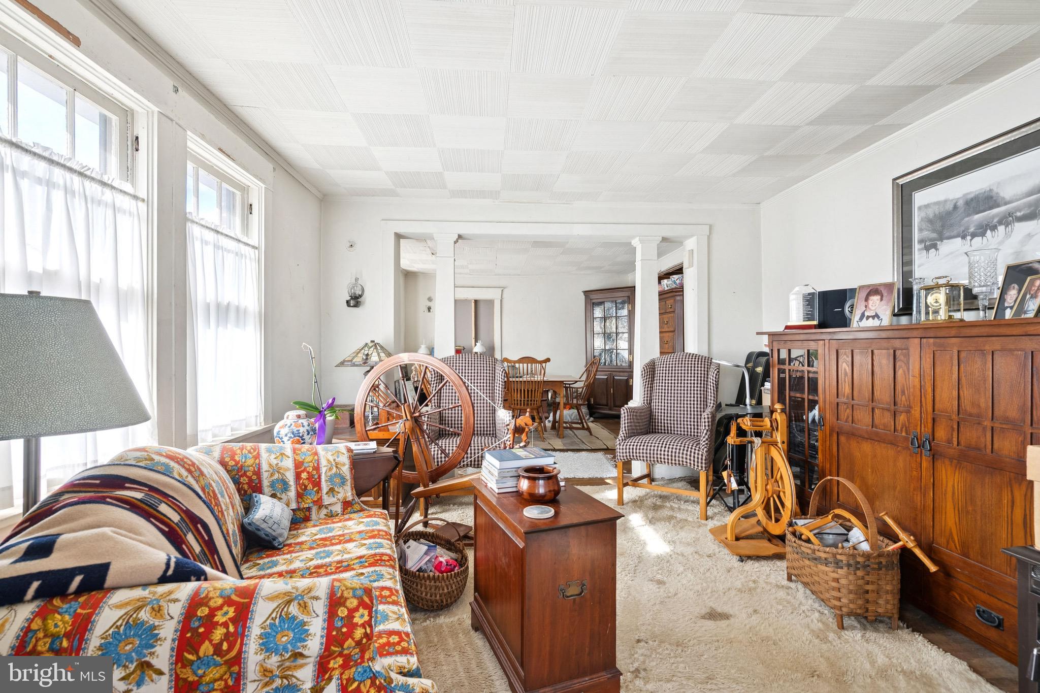 149 Highway 45 Mannington, NJ 08079 - Photo 5 of 24 a living room with furniture a couch and large window