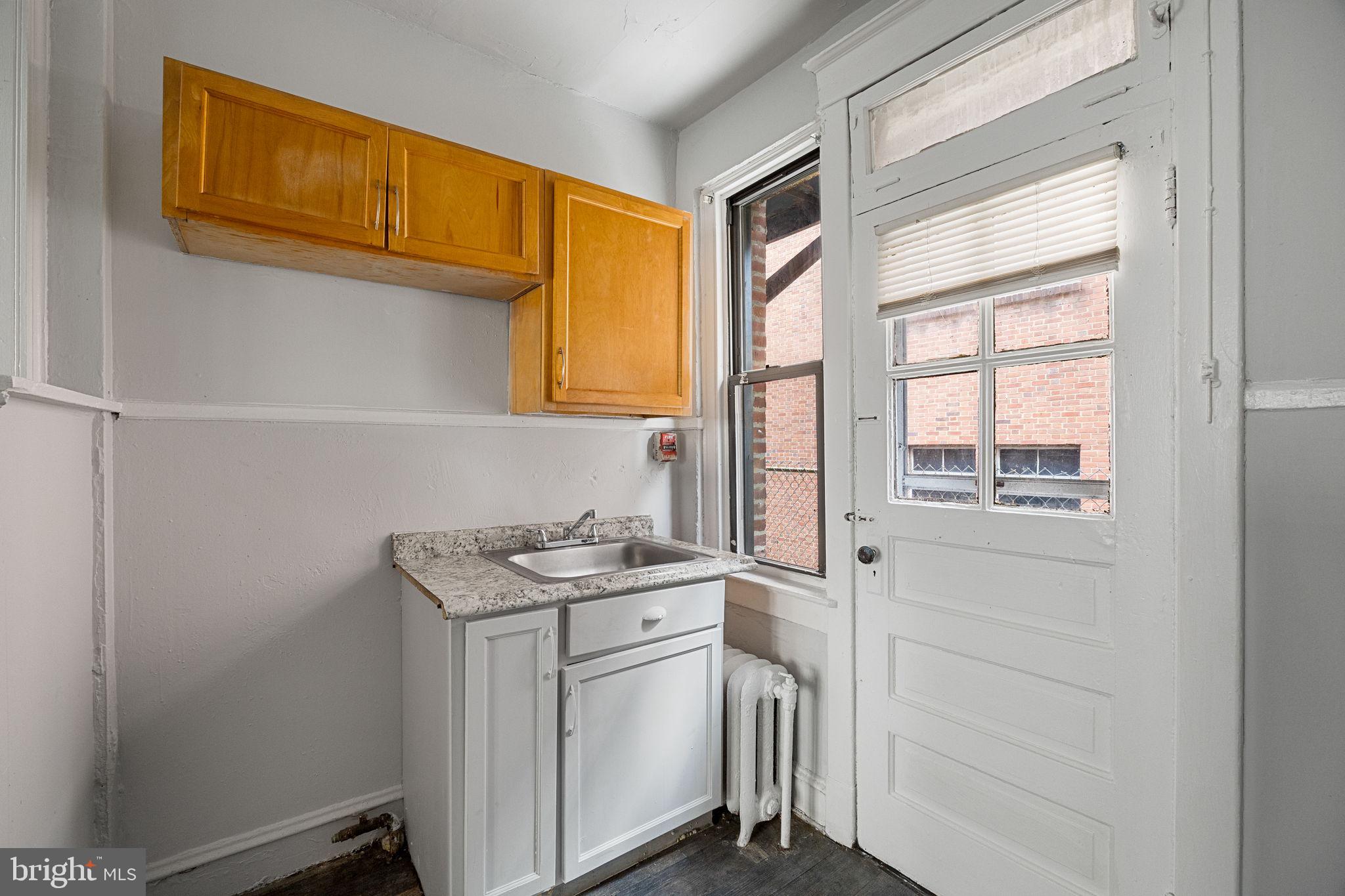 0 Garrett Road, Unit E201 Upper Darby, PA 19082 - Photo 11 of 19 a utility room with a window