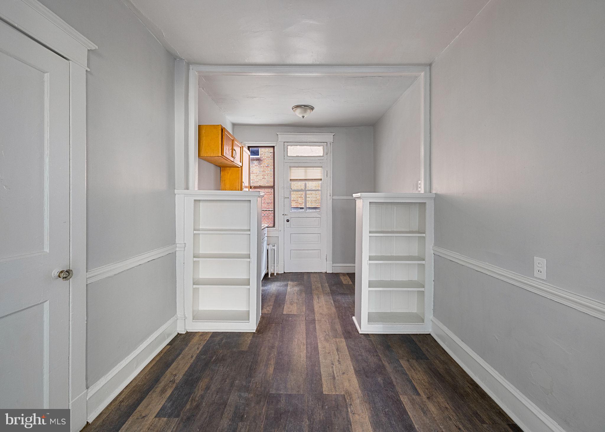 0 Garrett Road, Unit E201 Upper Darby, PA 19082 - Photo 10 of 19 a view of walk in closet with empty racks