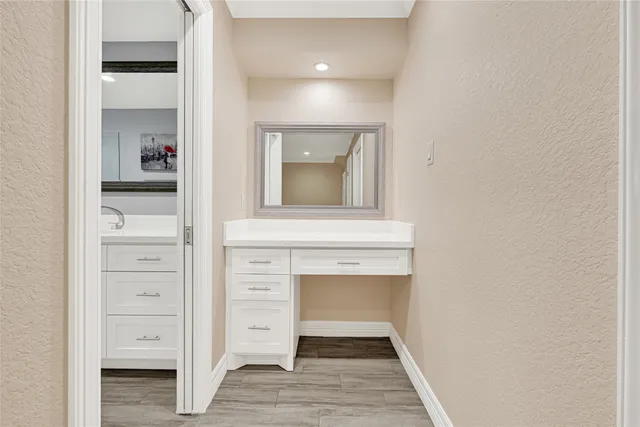a view of entryway with wooden floor and stairs
