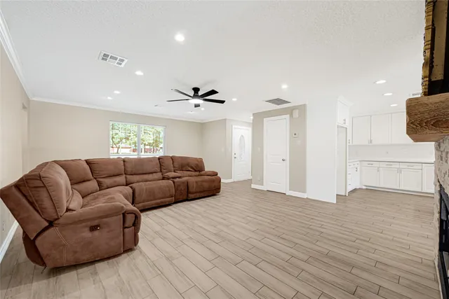 a kitchen with stainless steel appliances granite countertop a stove and a sink