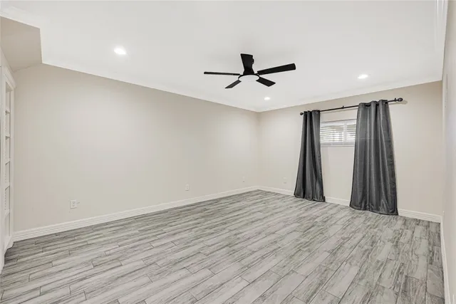 a bathroom with a double vanity sink toilet mirror and shower