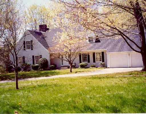 1200 Old Academy Road Fairfield, CT 06824 - Photo 1 of 1 a view of a house with a yard and tree s
