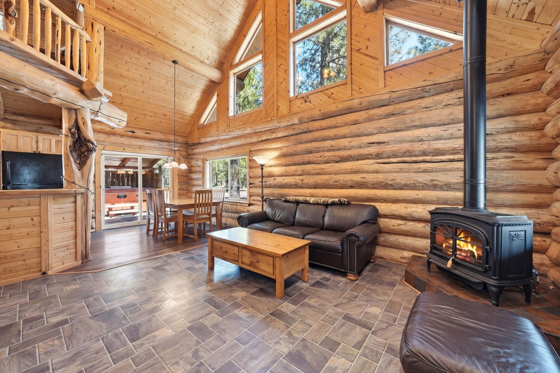 14177 Whitewater Loop La Pine, OR 97739 - Photo 4 of 38 a building outdoor space with patio furniture and potted plants