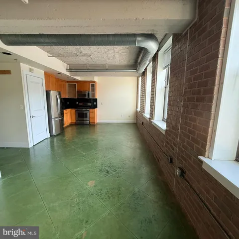 a bathroom with a shower and a bath tub