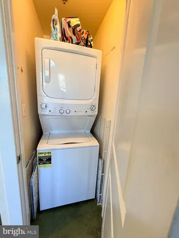 a bed room with a bed and a window