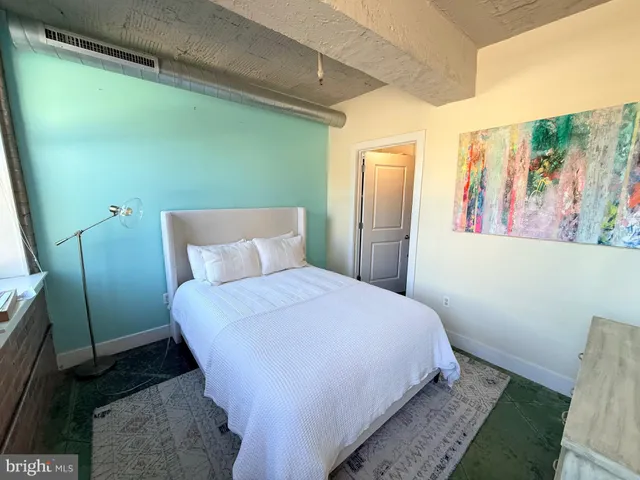 a bathroom with a tub and shower