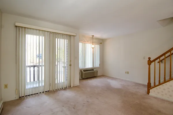 an empty room with windows