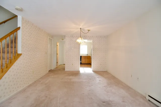 a kitchen with a sink and steel stainless steel appliances