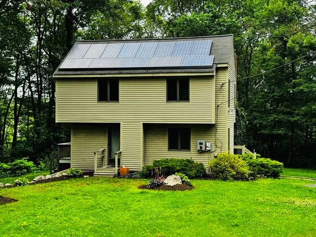 a view of a yard in front of house