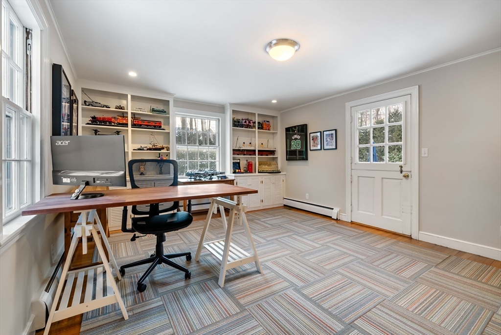 110 Hampshire Road Wellesley, MA 02481 - Photo 14 of 39 a view of a workspace with furniture window and wooden floor