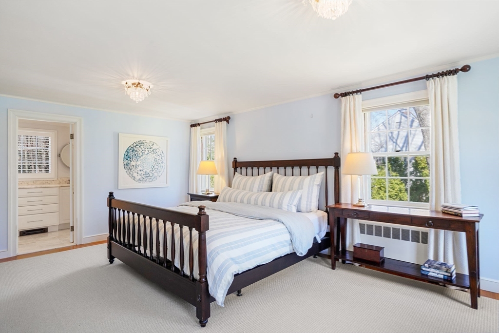 110 Hampshire Road Wellesley, MA 02481 - Photo 24 of 39 a bedroom with a bed and a window
