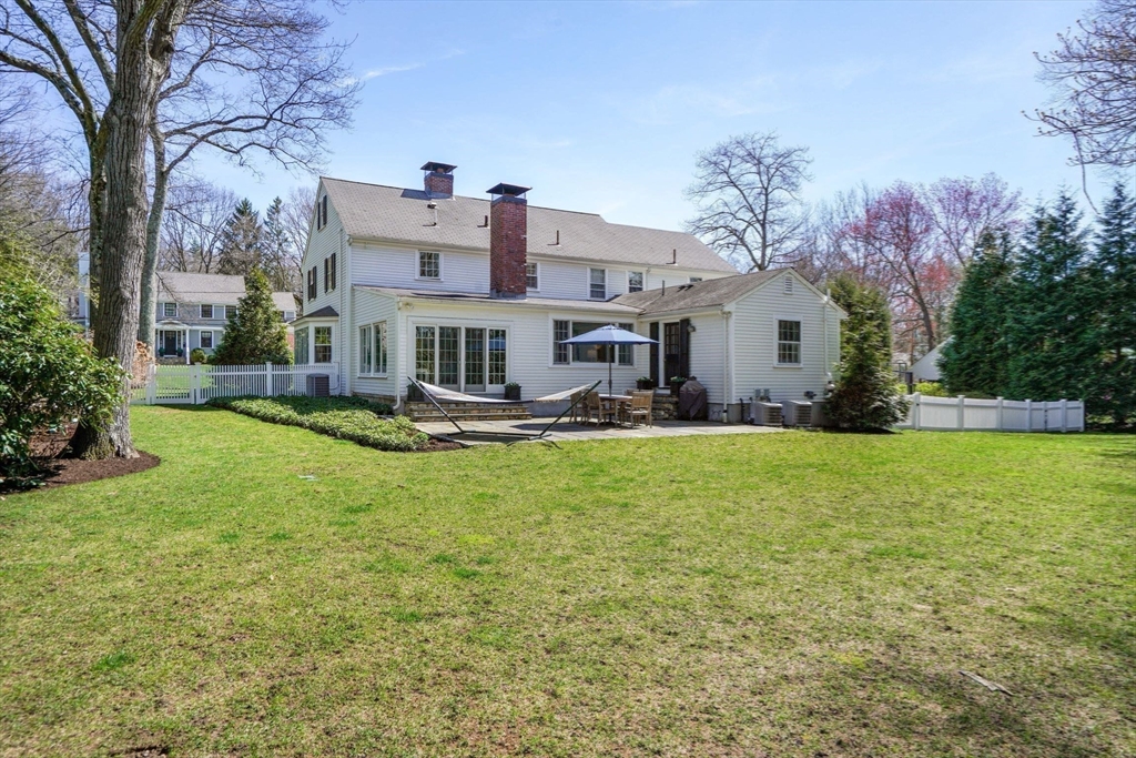 110 Hampshire Road Wellesley, MA 02481 - Photo 36 of 39 a front view of house with yard and trees