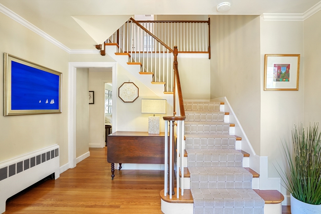 110 Hampshire Road Wellesley, MA 02481 - Photo 4 of 39 a view of entryway with wooden floor