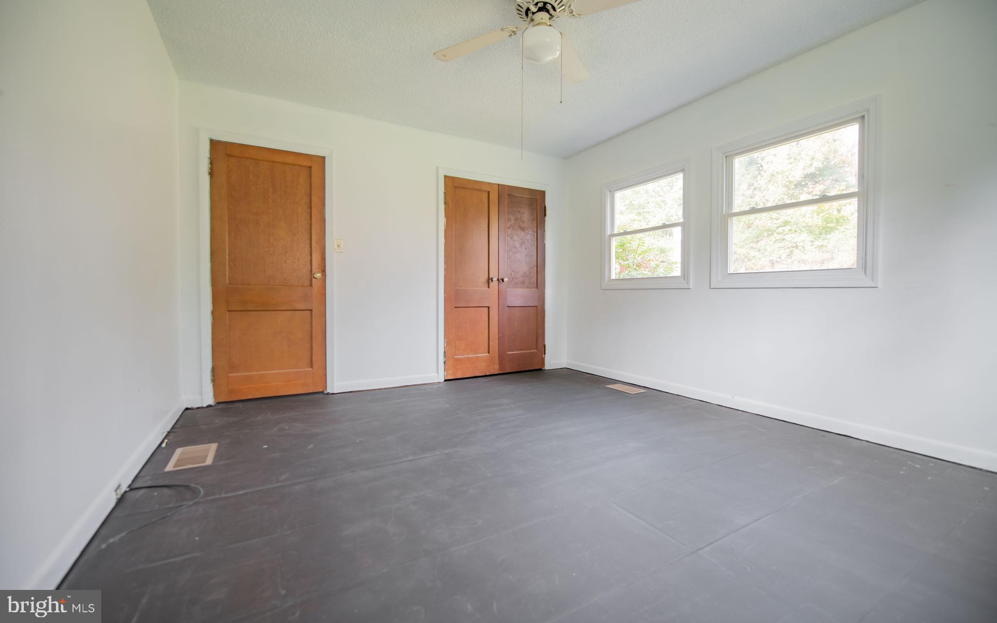 6 Oak Lane Lock Haven, PA 17745 - Photo 14 of 25 an empty room with windows and closet