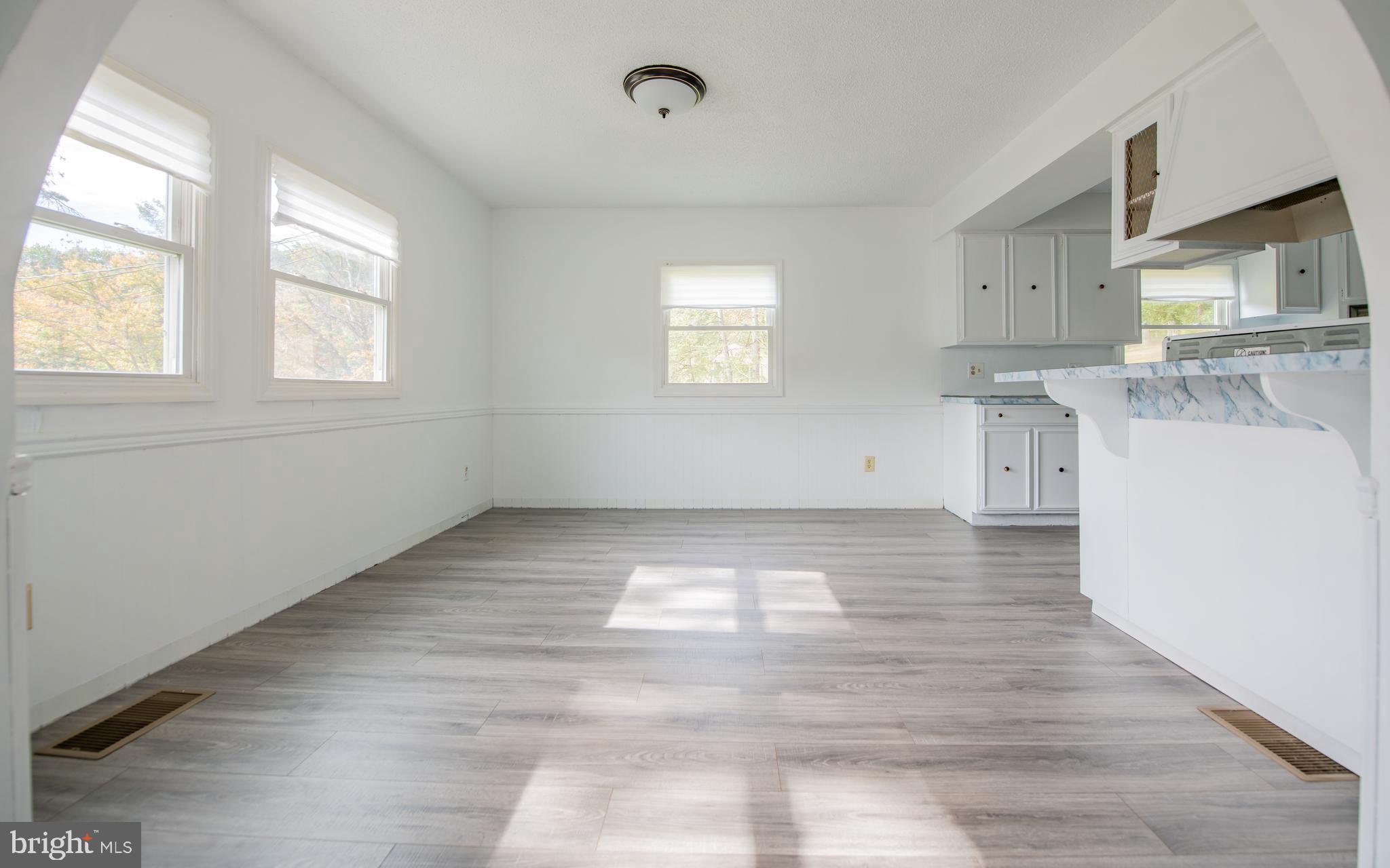 6 Oak Lane Lock Haven, PA 17745 - Photo 6 of 25 a view of a kitchen with wooden floor and a window