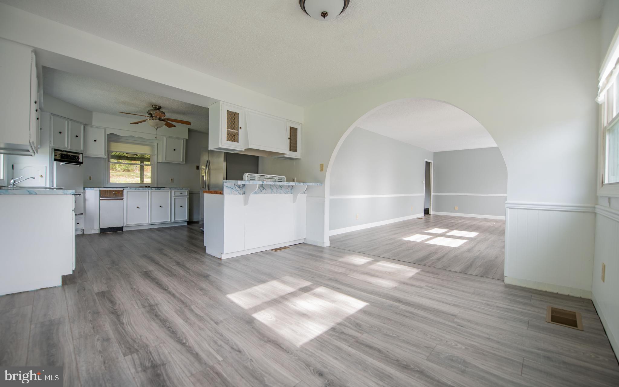 6 Oak Lane Lock Haven, PA 17745 - Photo 7 of 25 a view of a kitchen with wooden floor and a sink